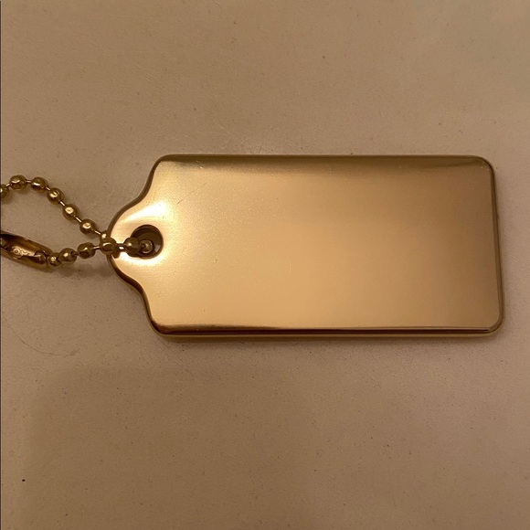 Coach metallic gold tag - Picture 2 of 2